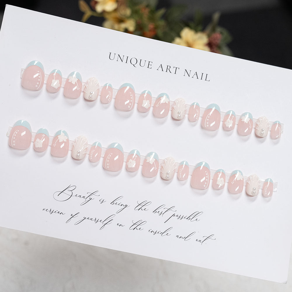 Decorative Press-On Nail Art Set with Floral and Shell Accents
