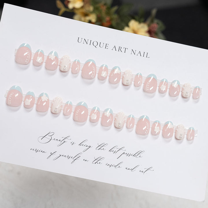 Decorative Press-On Nail Art Set with Floral and Shell Accents