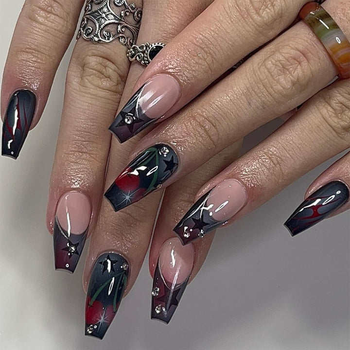 Artful nail art with elegant glitter accents and floral design Kalsten