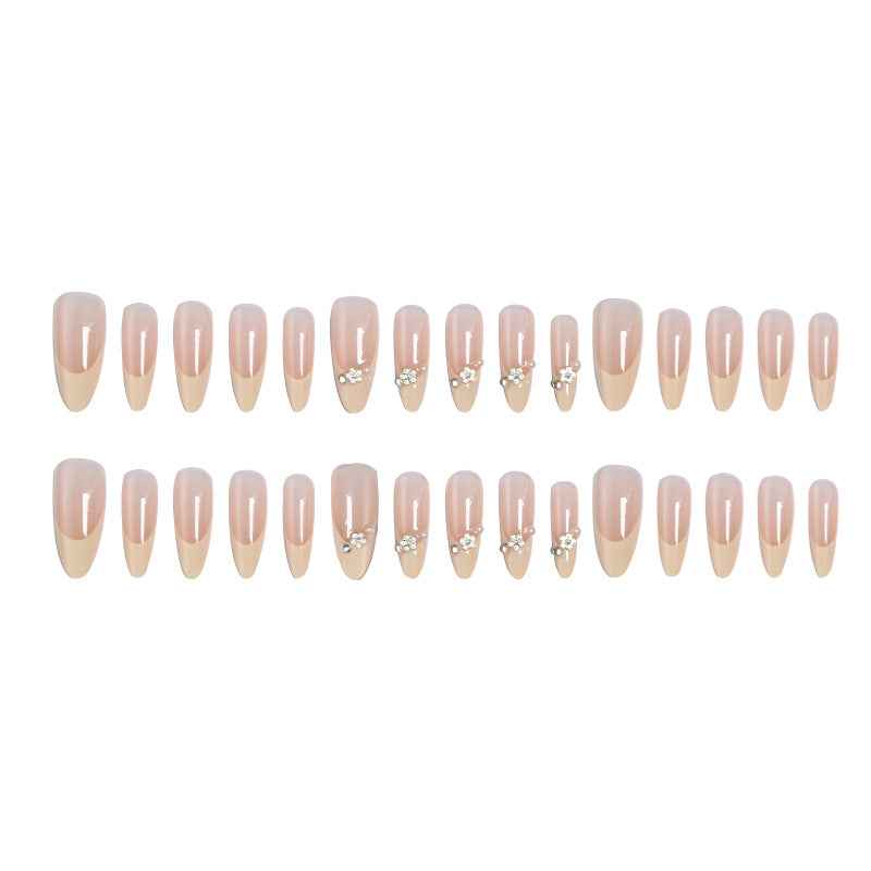 Acrylic nail set with elegant tips and sparkling appliqués Kalsten
