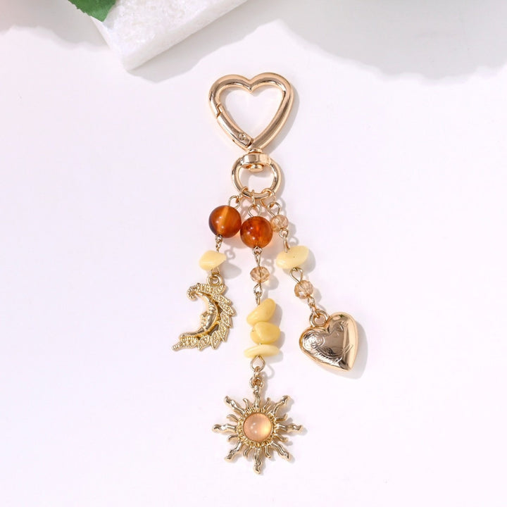 Keychain with Sparkling Sun Motif Kalsten