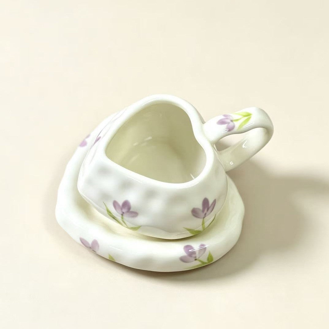 Heart-shaped ceramic cup set with saucer