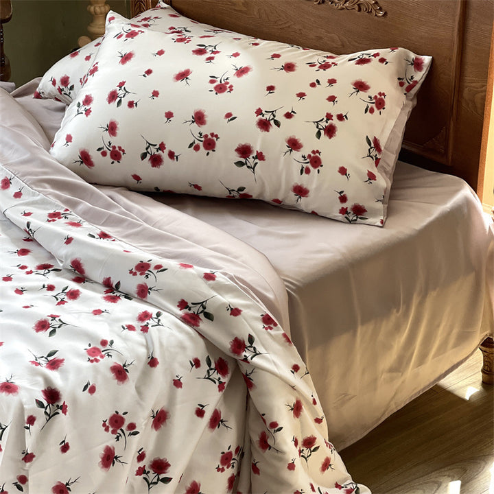 Satin bedding set with floral print and ruffle
