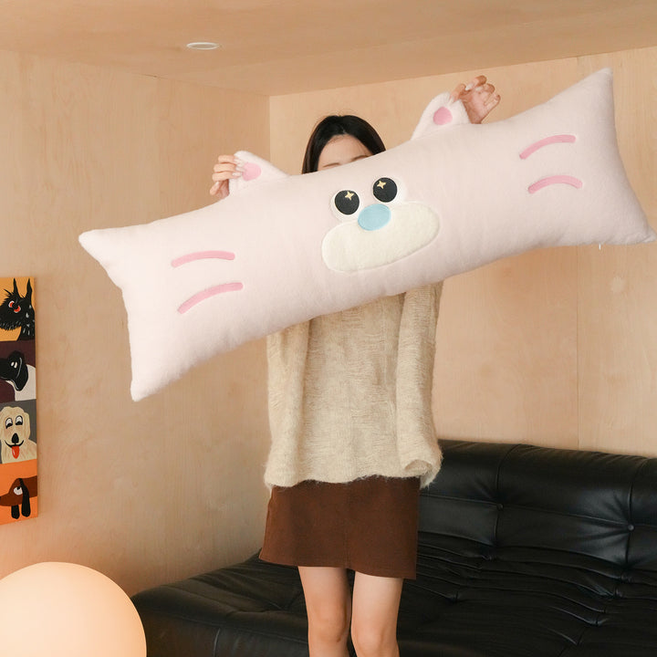 Extra-long plush sofa cushion with appliqués and plush feet