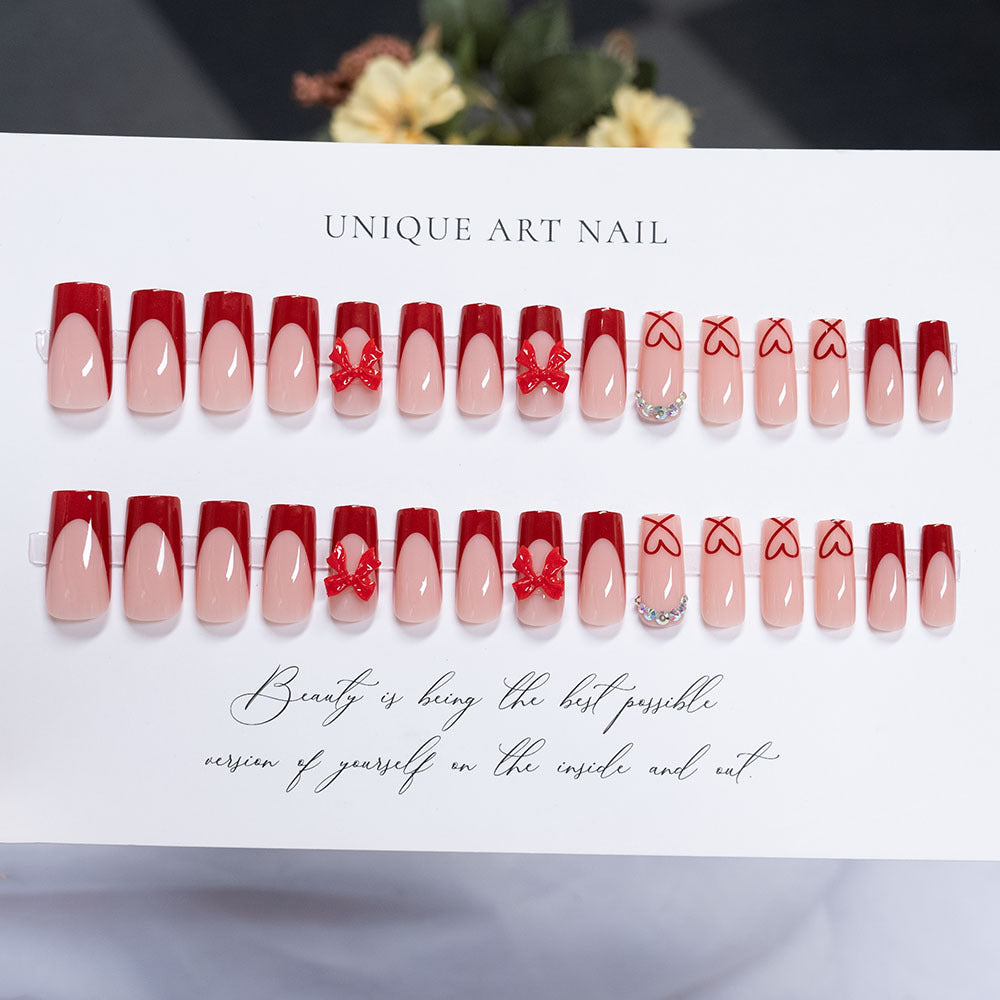 Artistic Press-On Nail Set with Heart and Bow Designs