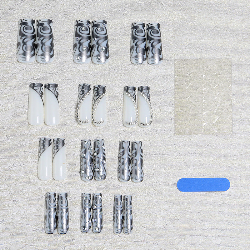 Acrylic nail set with elegant patterns and sparkling accents Kalsten