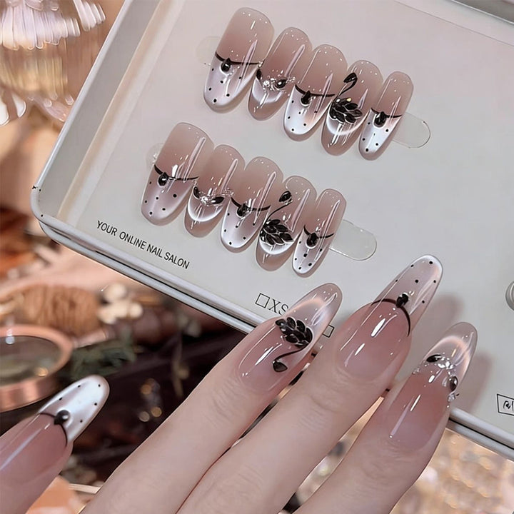 Artificial nail set with festive gift design and elegant glitter accents Kalsten