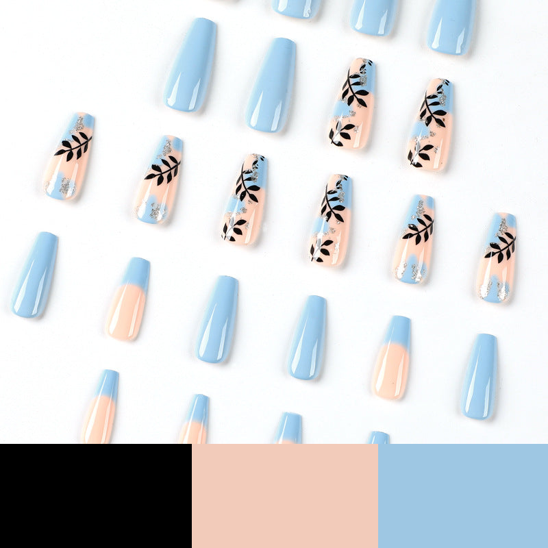 Artful Nail Art with Floral Designs and Glitter Kalsten