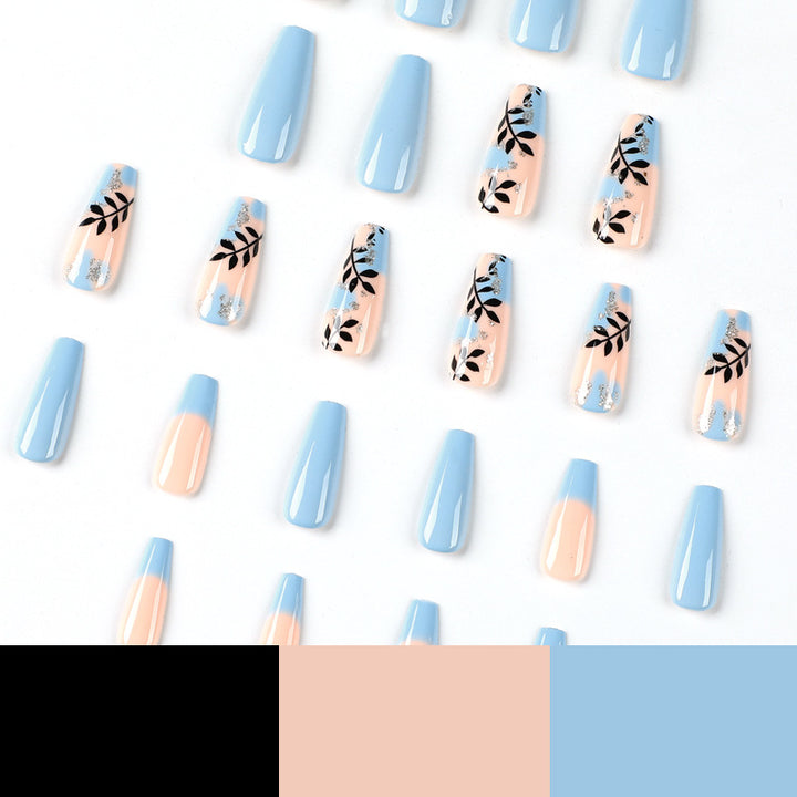 Artful Nail Art with Floral Designs and Glitter Kalsten