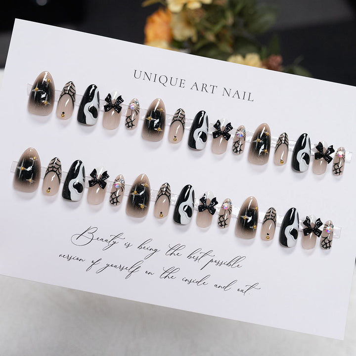 Artistic Press-On Nail Set with Unique Black and White Design