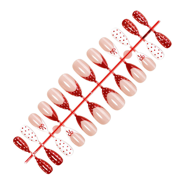 Nail set with elegant bows and polka dots Kalsten