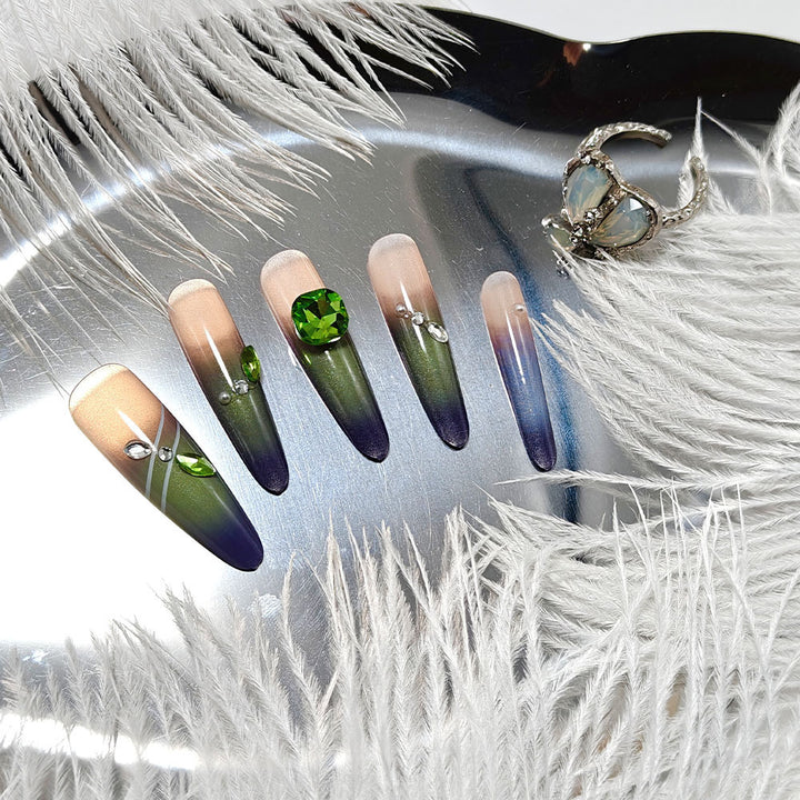 Artificial nails with elegant ombre design and rhinestone applications Kalsten