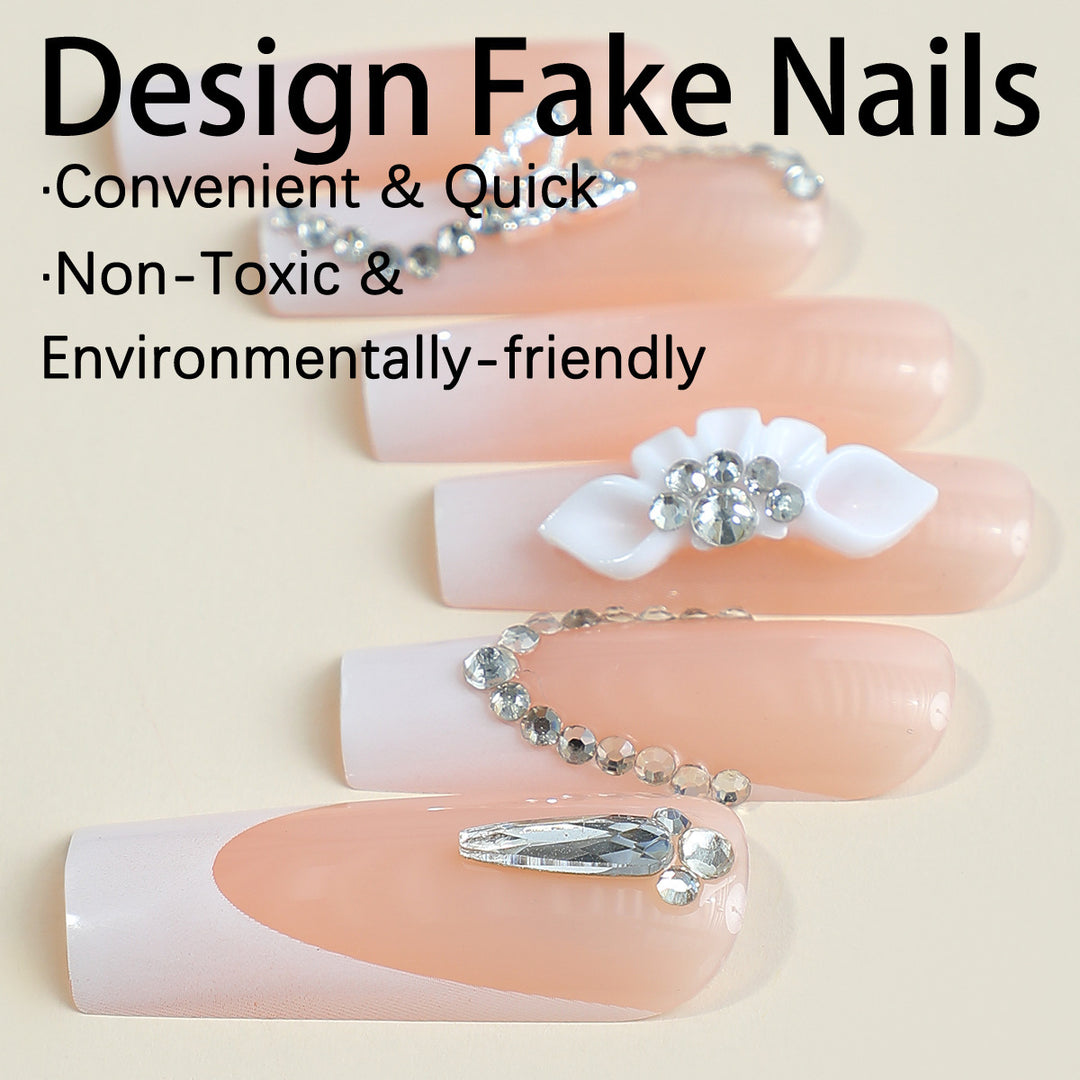 Artificial nail set with elegant French tips and glamorous embellishments Kalsten