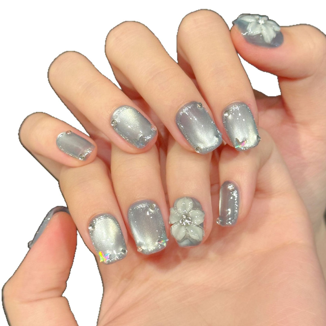 Artistic Press-On Nail Set with Floral and Rhinestone Accents