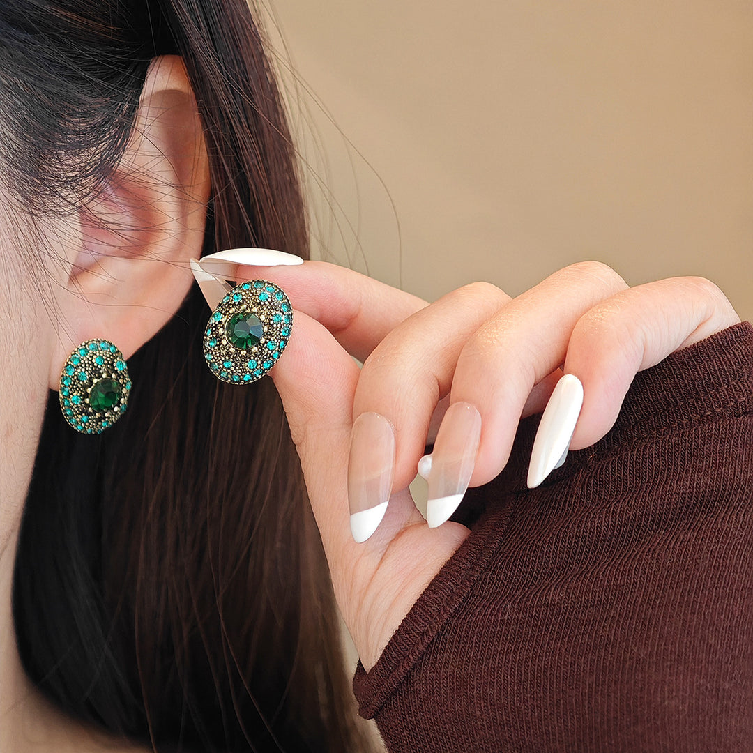 Sparkling stud earrings with intricate details Kalsten
