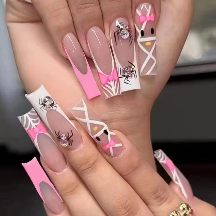 Artistic Press-On Nail Extensions with Spider and Bow Design Kalsten