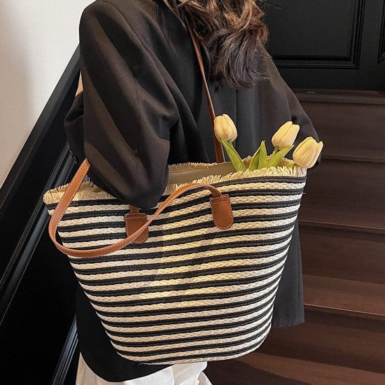 Generous beach bag with leather handles Kalsten