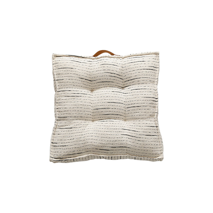Filled floor cushion with quilted seat surface, carrying handle and fine stripe woven pattern