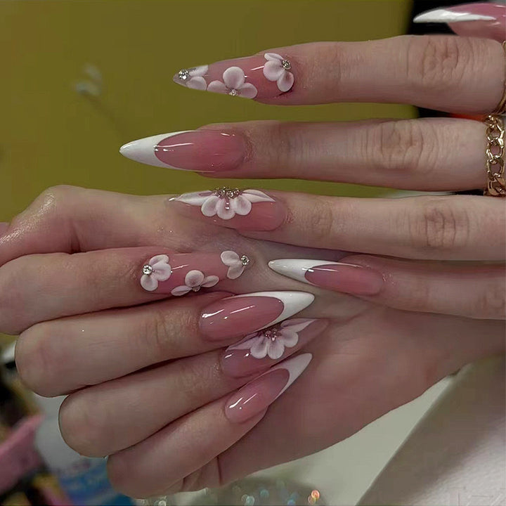 Elegant artificial nail set with floral design and glitter accents Kalsten