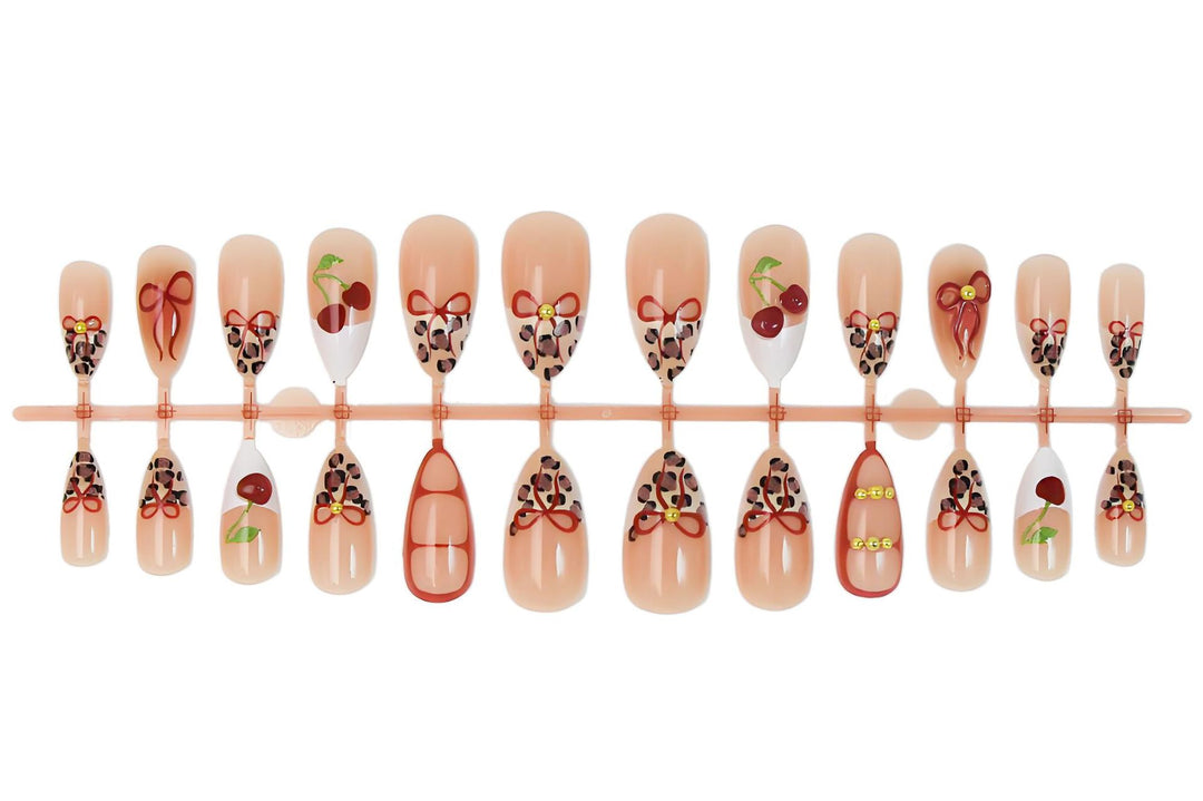 Artificial nail set with creative ribbon and fruit designs Kalsten