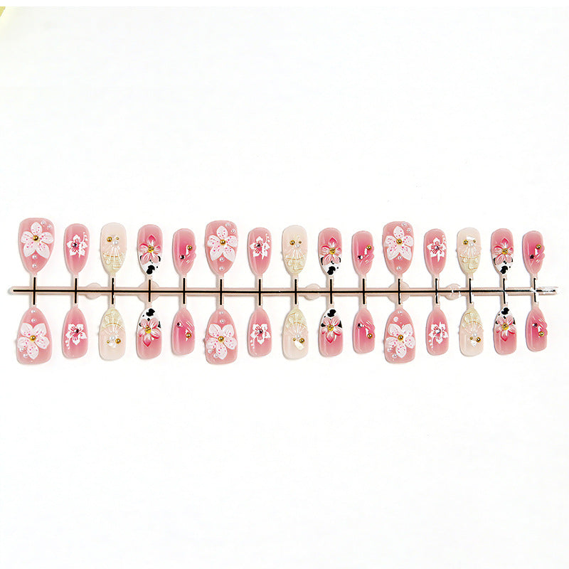 Artificial nail set with elegant floral accents Kalsten