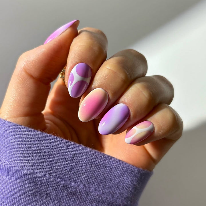 Elegant and creative nail art with a gentle gradient and geometric accents Kalsten