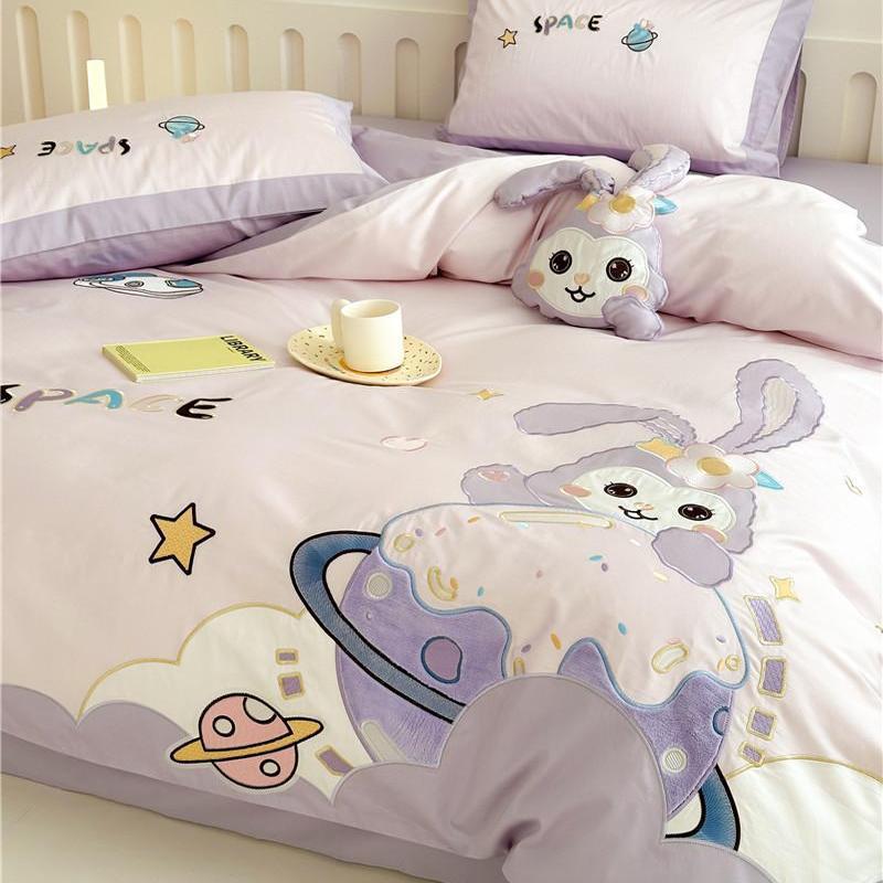 Children's bedding set with playful space bunny design
