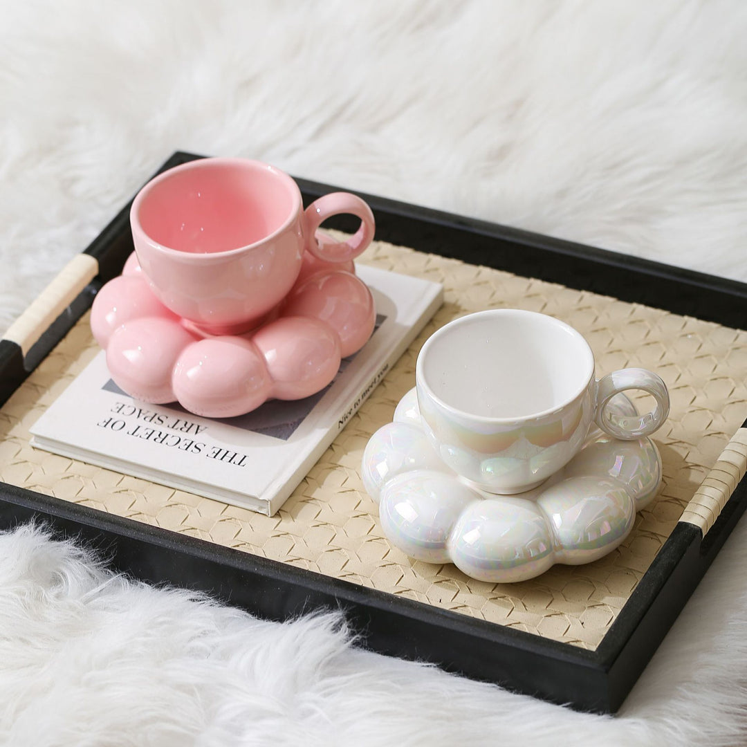 Ceramic mug with sculptural bubble saucer