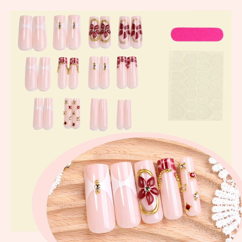 Artificial nail set with floral decorations and elegant accents Kalsten