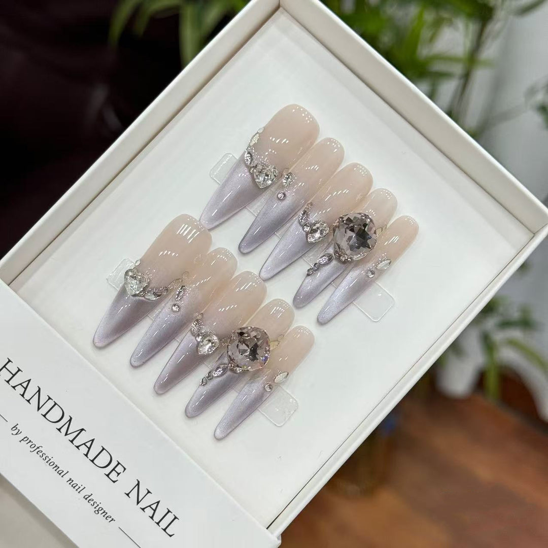 Artistic Stiletto Press-On Nails with Elegant Gem Accents