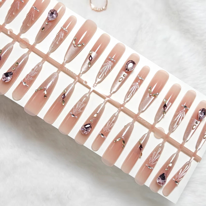 Artificial nails with glamorous crystal embellishments Kalsten
