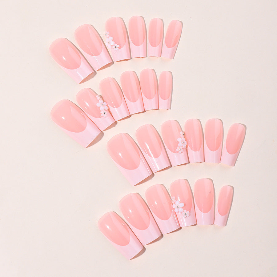 Artificial nail set with elegant French tips and hand-drawn flower motifs Kalsten