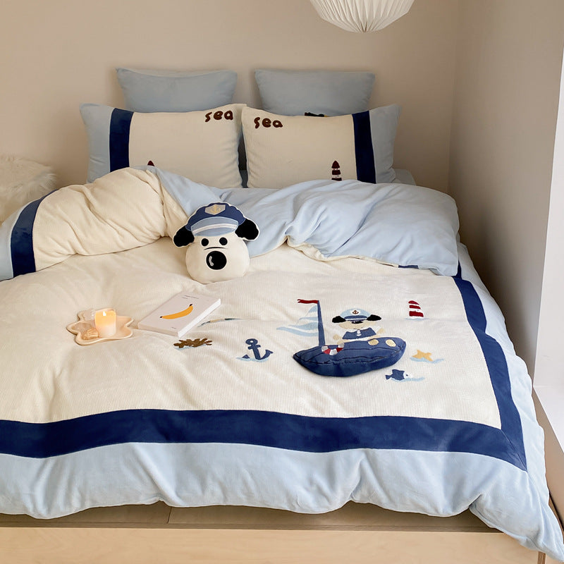 Children's bedding set with quilted blanket, waffle texture and embroidered sea motif