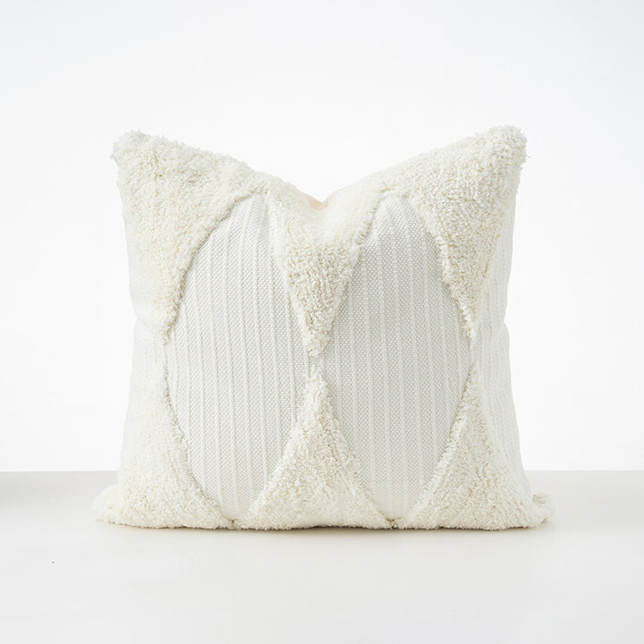 Square cushions with structured boucle look, quilted tufting and decorative tassels