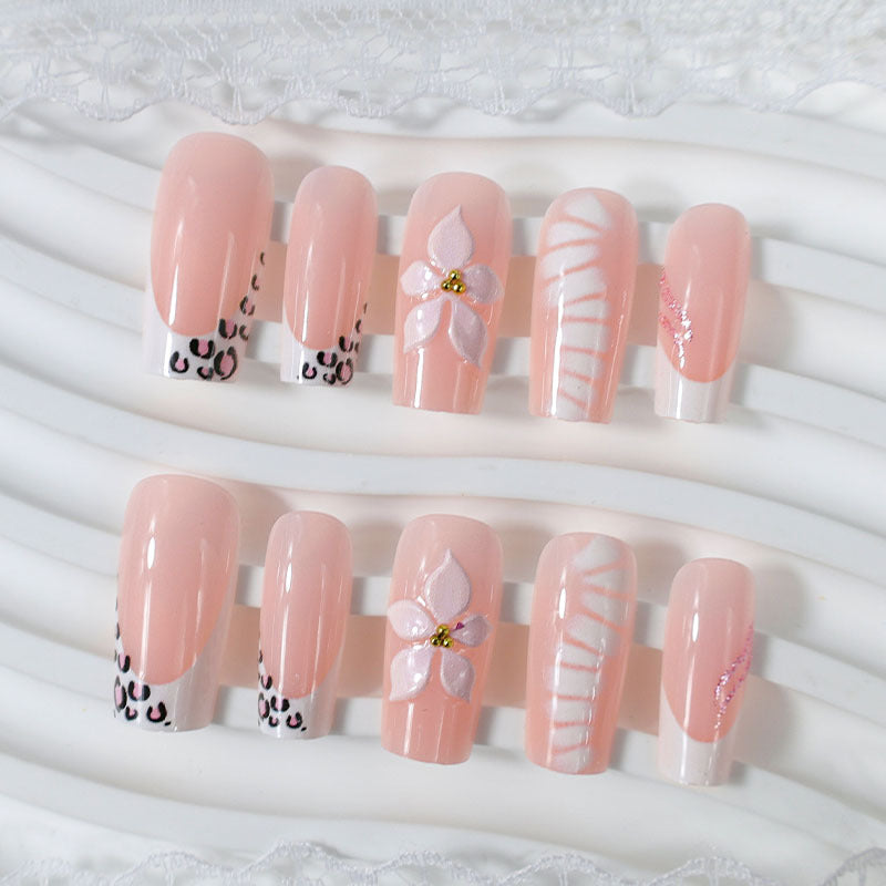Elegant artificial nail set with floral and animal accents Kalsten