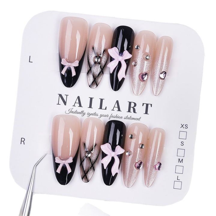 Artificial nails with playful bow design and glitter effects Kalsten