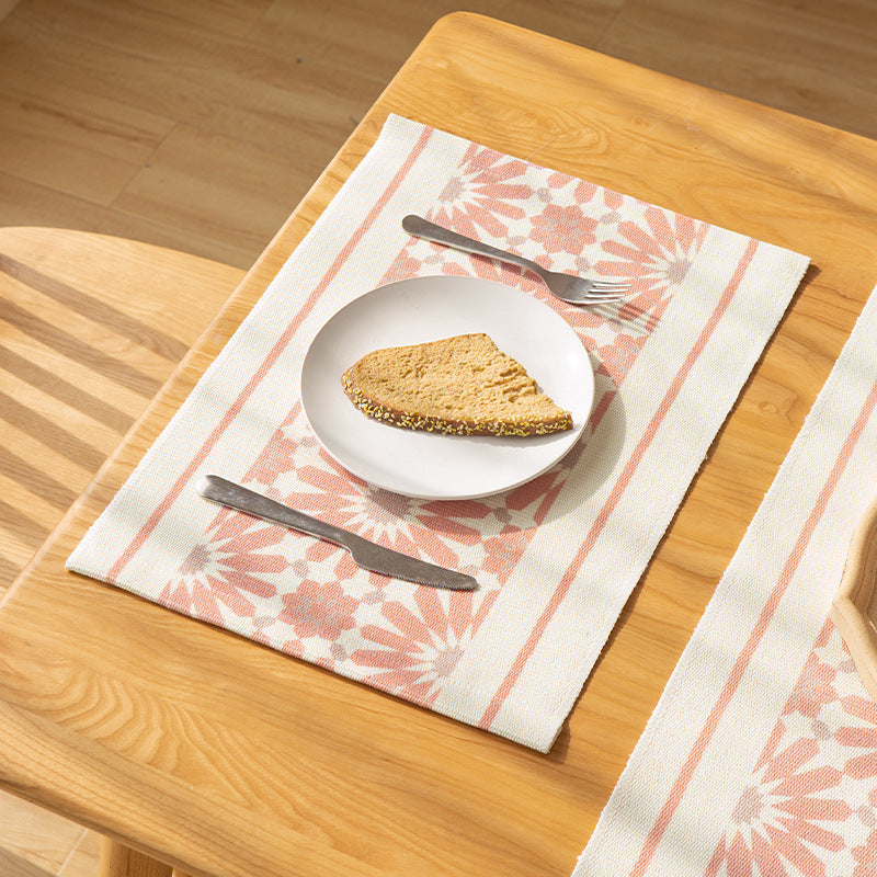 Woven rectangular table set made of cotton blend with central diamond band