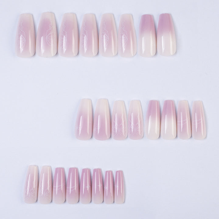 Artificial nails with delicate ombre effect and floral accents Kalsten