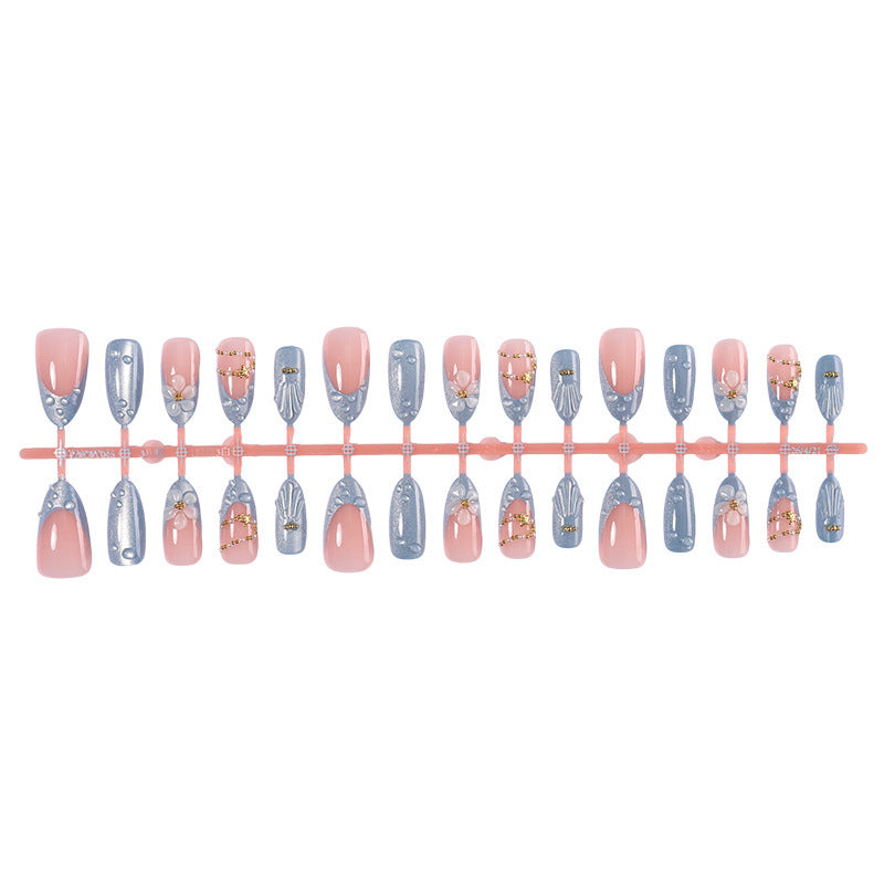Creative acrylic nail set with elegant flower and glitter accents Kalsten