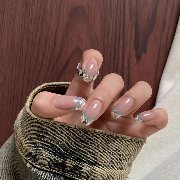 Artificial nails with shimmering glitter and elegant French-tip design Kalsten