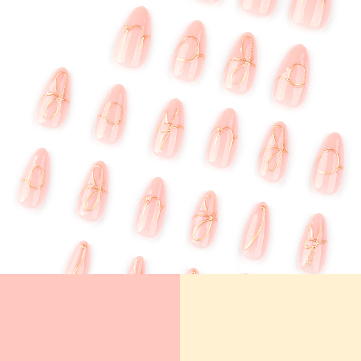 Creative nail art with golden accents and trendy lettering Kalsten