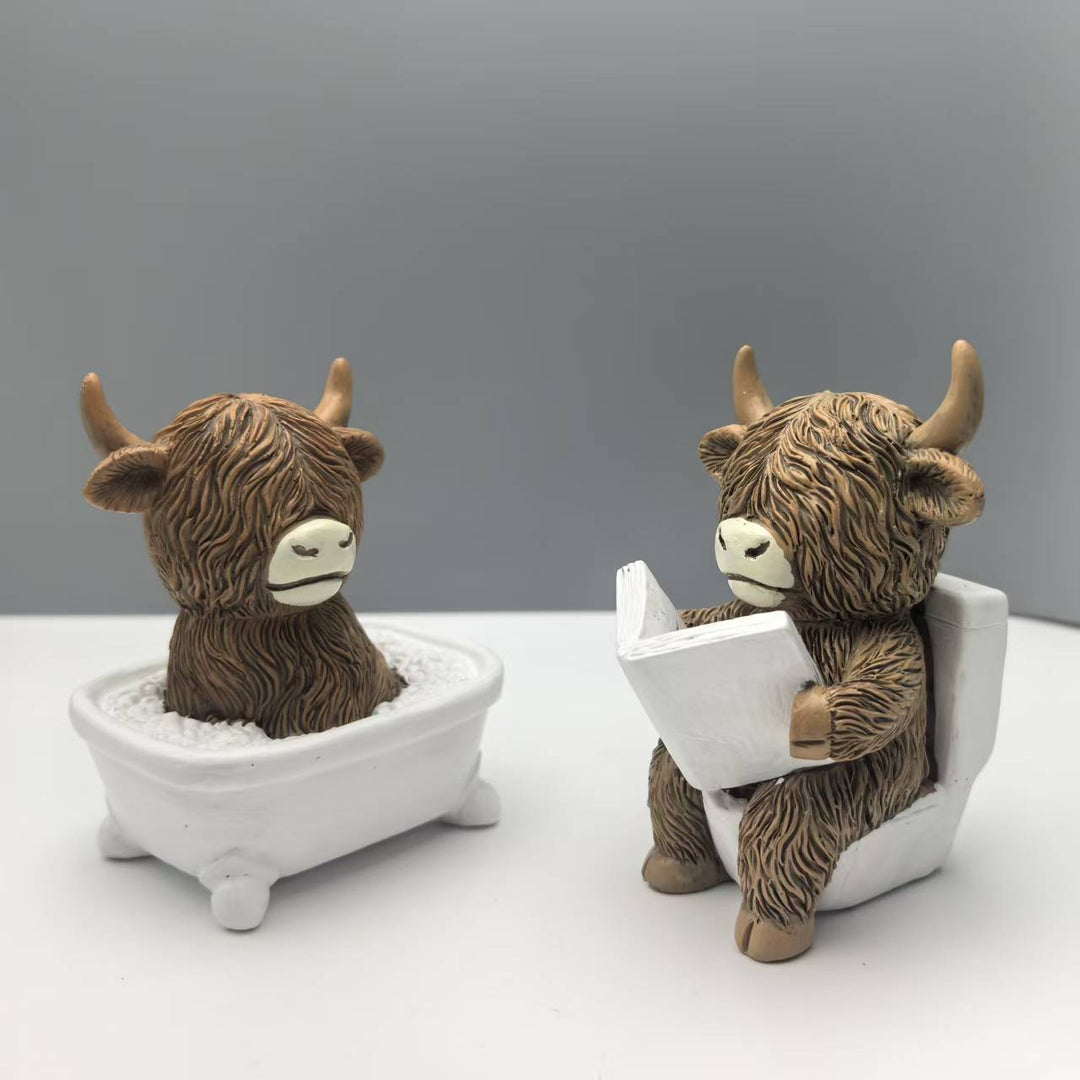 Funny decorative figure of a Highland cow in a bathtub Kalsten