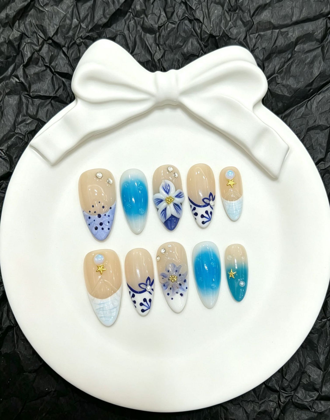 Artistic Press-On Nail Art Set with Floral and Gem Accents