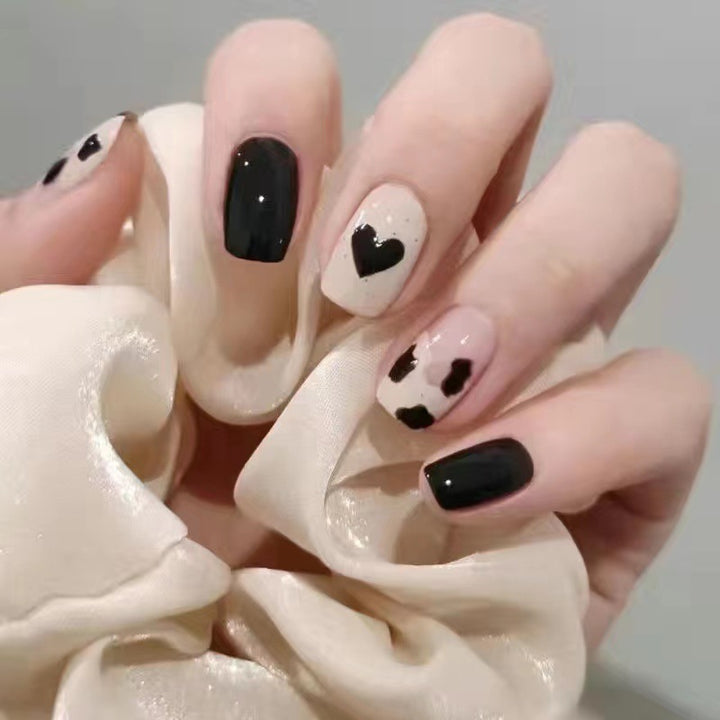 Creative nail art with heart and animal motifs Kalsten