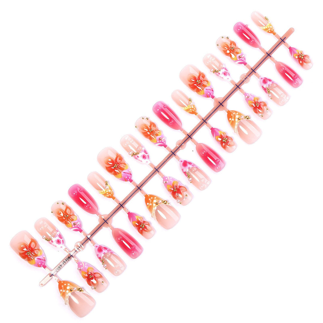 Artificial nail set with floral designs and elegant embellishments Kalsten