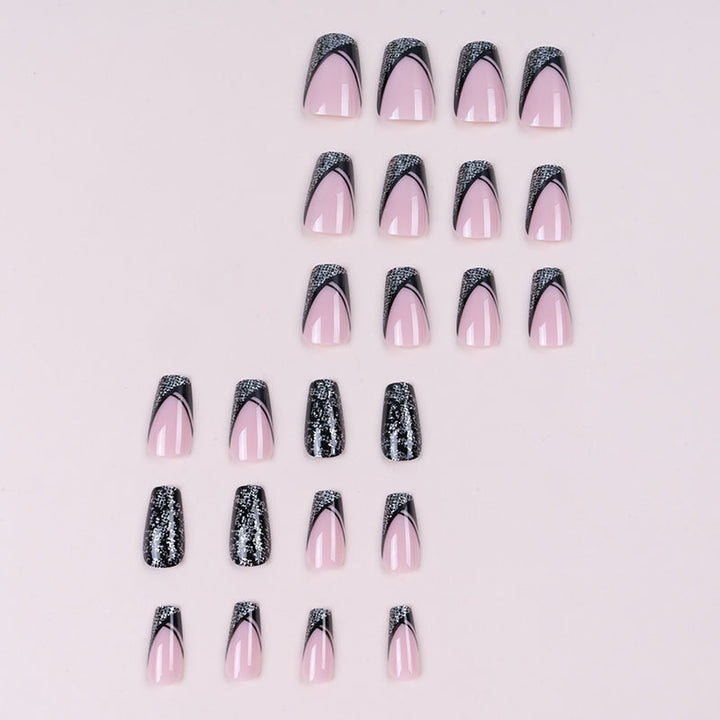 Elegant Long-Stiletto Press-On Nails with Intricate Glossy Design