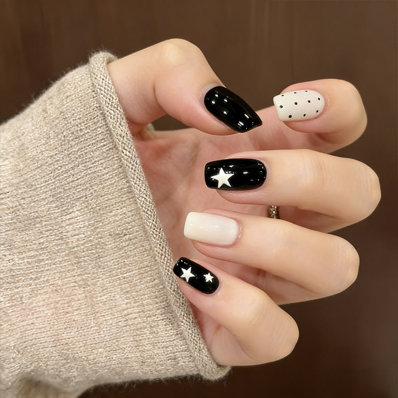 Artistic Press-On Nail Design with Stars and Polka Dots Kalsten