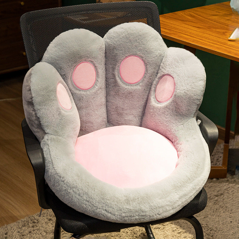 Plush pet bed with raised edge and removable cuddly pillow