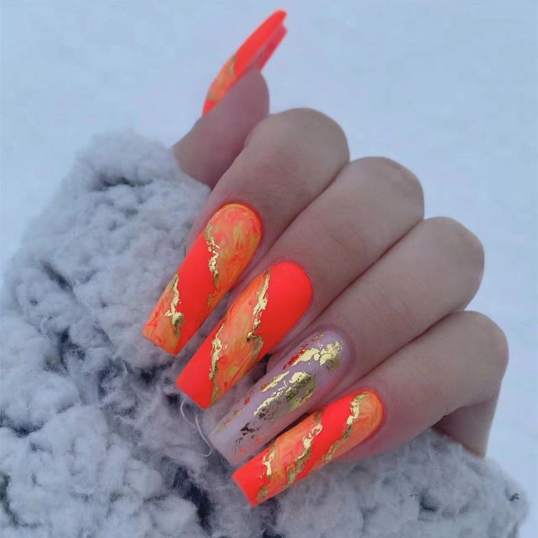 Artistic Press-On Nails with Gold Accents