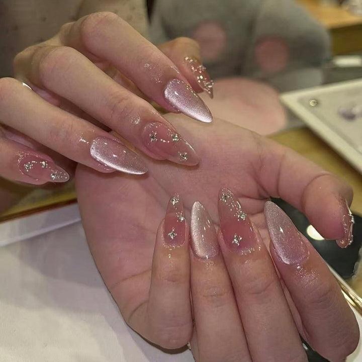 Artful stiletto nails with glitter accents Kalsten